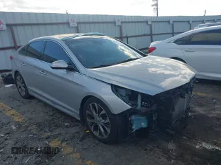2015 Hyundai Sonata Limited z VIN 5NPE34AB2FH151745, wystawiony jako IAAI lot #40773654 z przebiegiem 119 339 mil mil oraz . Historia ofert i sprzedaży dostępna na DreamBid. Obrazek 1.