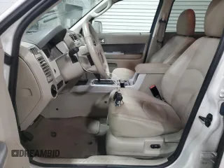 2009 Mercury Mariner Premier with VIN 4M2CU97G09KJ06145, listed as a Copart auction lot 47119525 with 158,430 mi miles and Salvage title. Bid and sale history available at DreamBid. Image 7.