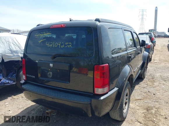 2009 Dodge Nitro SE z VIN 1D8GT28K69W505396, wystawiony jako IAAI lot #42104252 z przebiegiem 144 026 mil mil oraz . Historia ofert i sprzedaży dostępna na DreamBid. Obrazek 4.