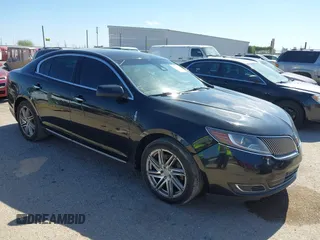 2014 Lincoln MKS z VIN 1LNHL9DK0EG606340, wystawiony jako IAAI lot #42490297 z przebiegiem 197 435 mil mil oraz . Historia ofert i sprzedaży dostępna na DreamBid. Obrazek 1.