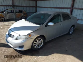 2010 Toyota Corolla with VIN 2T1BU4EE0AC269888, listed as a IAAI auction lot 41926103 with 210,787 mi miles. Bid and sale history available at carsss.com. Image 2.