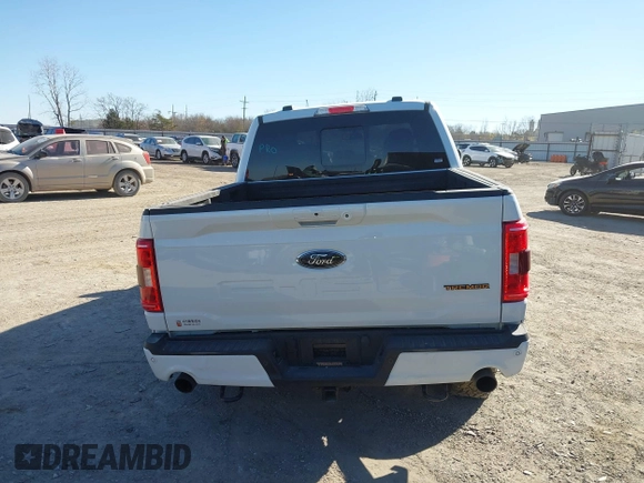 2023 Ford F-150 XL with VIN 1FTFW1E56PFC91467, listed as a IAAI auction lot 41030658 with 31,325 mi miles. Bid and sale history available at carsss.com. Image 17.