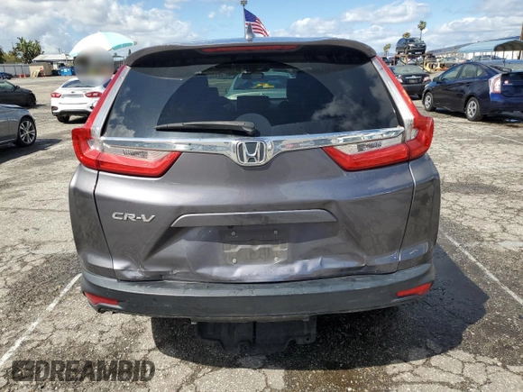 2019 Honda CR-V EX with VIN 7FARW1H52KE024241, listed as a Copart auction lot 46445733 with 54,145 mi miles and . Bid and sale history available at DreamBid. Image 6.