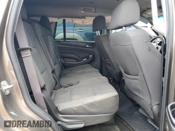 2016 Chevrolet Tahoe LS z VIN 1GNSCAECXGR340617, wystawiony jako Copart lot #56307315 z przebiegiem Nie podano mil oraz Czysty tytuł • Clean title. Historia ofert i sprzedaży dostępna na DreamBid. Obrazek 10.