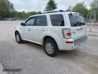 2008 Mercury Mariner Premier with VIN 4M2CU87118KJ11472, listed as a IAAI auction lot 42063566 with 128,274 mi miles. Bid and sale history available at carsss.com. Image 3.