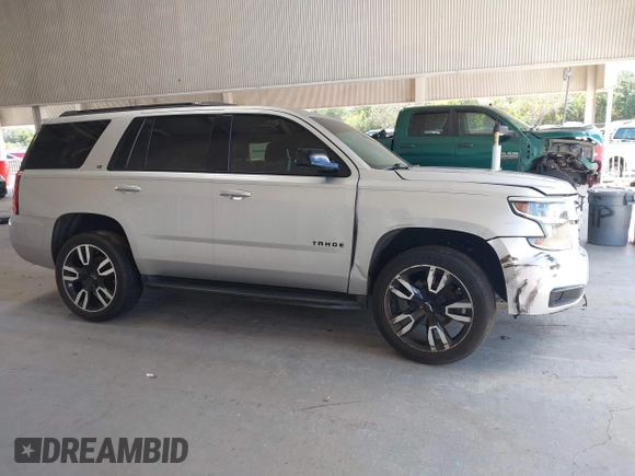 2019 Chevrolet Tahoe LT with VIN 1GNSCBKC0KR240660, listed as a IAAI auction lot 42265044 with 109,720 mi miles and . Bid and sale history available at DreamBid. Image 14.