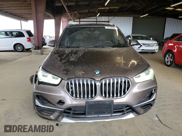 2020 BMW X1 xDrive28i with VIN WBXJG9C05L5R40935, listed as a Copart auction lot 47145335 with 46,554 mi miles and Salvage Title. Bid and sale history available at carsss.com. Image 5.
