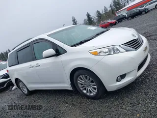 2014 Toyota Sienna XLE with VIN 5TDYK3DC2ES485846, listed as a IAAI auction lot 41693092 with 106,156 mi miles and . Bid and sale history available at DreamBid. Image 14.