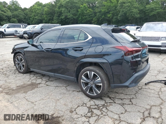 2023 Lexus UX 250h Premium с VIN JTHP6JBH8P2133821, выставлен на аукционе Copart как лот 61007355 с пробегом 32 540 миль миль и Списание • Salvage title. История ставок и продаж доступна на DreamBid. Изображение 2.