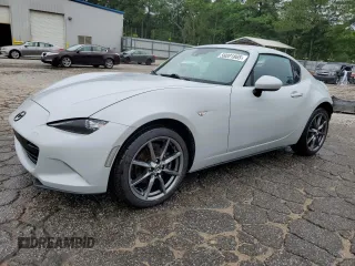 2017 Mazda MX-5 Miata Grand Touring z VIN JM1NDAM70H0104393, wystawiony jako Copart lot #58081805 z przebiegiem 76 279 mil mil oraz Szkoda całkowita • Salvage title. Historia ofert i sprzedaży dostępna na DreamBid. Obrazek 1.