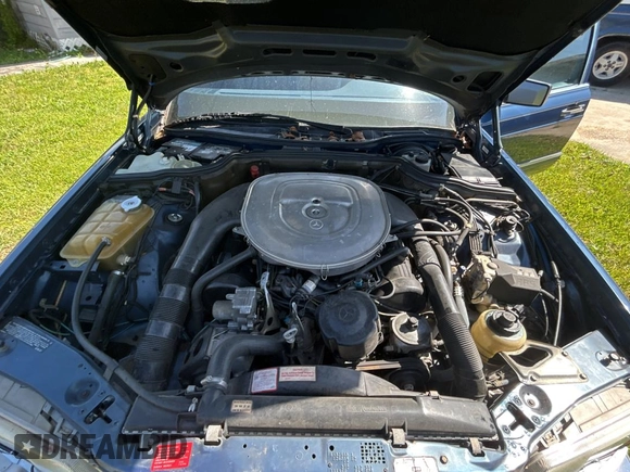 1988 Mercedes-Benz 560 with VIN WDBCA39D0JA421504, listed as a Copart auction lot 52342525 with 82,277 mi miles and Clean Title. Bid and sale history available at DreamBid. Image 7.
