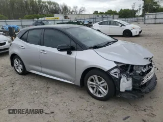 2022 Toyota Corolla Hatchback SE with VIN JTNB4MBEXN3165312, listed as a Copart auction lot 51041435 with 25,211 mi miles and Salvage Title. Bid and sale history available at carsss.com. Image 4.
