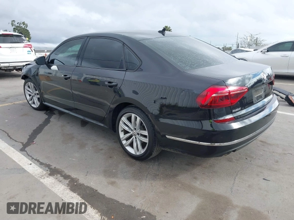 2019 Volkswagen Passat 2.0T Wolfsburg Edition with VIN 1VWLA7A34KC012887, listed as a IAAI auction lot 41792604 with 70,237 mi miles. Bid and sale history available at carsss.com. Image 3.