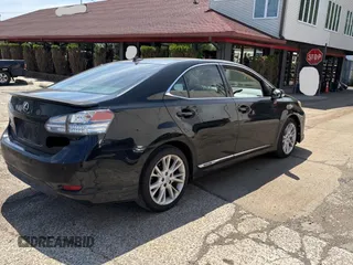 2010 Lexus HS 250h with VIN JTHBB1BA1A2020910, listed as a Copart auction lot 57009775 with 263,515 mi miles and Clean Title. Bid and sale history available at DreamBid. Image 4.