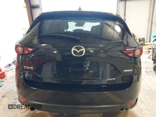 2020 Mazda CX-5 Grand Touring with VIN JM3KFADM3L0742625, listed as a IAAI auction lot 41715580 with 45,562 mi miles. Bid and sale history available at carsss.com. Image 17.