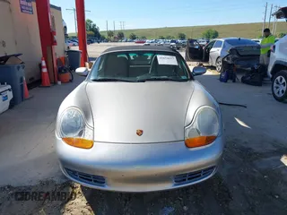 2002 Porsche Boxster z VIN WP0CA29882U622162, wystawiony jako IAAI lot #41654257 z przebiegiem 44 608 mil mil oraz . Historia ofert i sprzedaży dostępna na DreamBid. Obrazek 12.