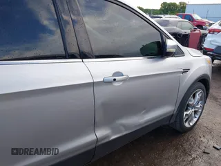 2013 Ford Escape Titanium with VIN 1FMCU0J90DUC13877, listed as a IAAI auction lot 42370172 with 119,745 mi miles and . Bid and sale history available at DreamBid. Image 6.