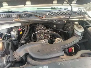 2003 Chevrolet Tahoe LS z VIN 1GNEC13Z63R140932, wystawiony jako IAAI lot #41703060 z przebiegiem 345 133 mil mil oraz . Historia ofert i sprzedaży dostępna na DreamBid. Obrazek 13.