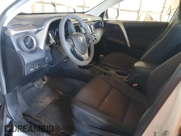 2017 Toyota RAV4 LE with VIN JTMBFREV7HJ148815, listed as a Copart auction lot 82632724 with 24,775 mi miles and Salvage Title. Bid and sale history available at DreamBid. Image 7.