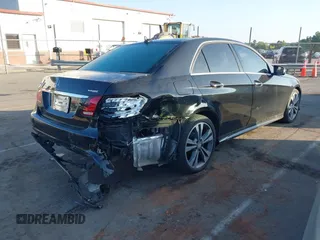 2014 Mercedes-Benz E 350 Sport with VIN WDDHF5KB5EB008478, listed as a IAAI auction lot 42149998 with 103,580 mi miles and . Bid and sale history available at DreamBid. Image 4.