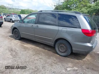 2004 Toyota Sienna CE with VIN 5TDZA23C34S129567, listed as a IAAI auction lot 42186295 with 184,220 mi miles and . Bid and sale history available at DreamBid. Image 3.