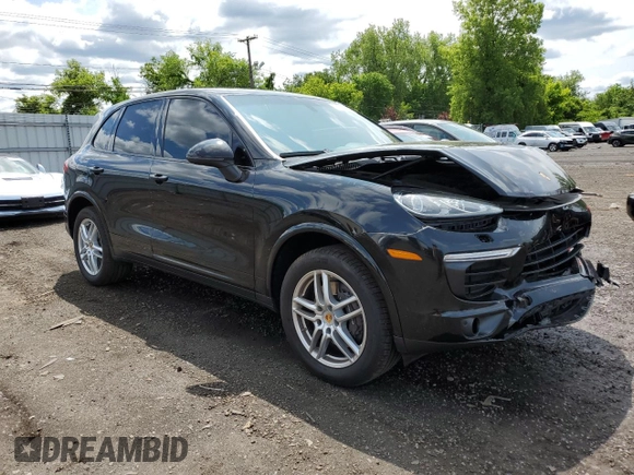 2018 Porsche Cayenne with VIN WP1AA2A27JKA06735, listed as a Copart auction lot 59016435 with 96,559 mi miles and Salvage title. Bid and sale history available at DreamBid. Image 4.