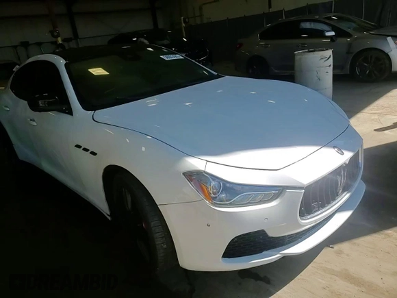 2017 Maserati Ghibli S Q4 z VIN ZAM57RTAXH1221570, wystawiony jako Copart lot #56003065 z przebiegiem 96 414 mil mil oraz Szkody całkowita. Historia ofert i sprzedaży dostępna na DreamBid. Obrazek 14.