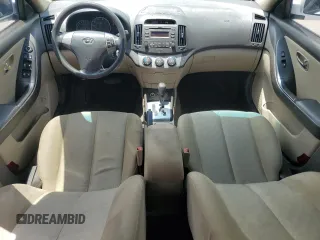 2010 Hyundai Elantra GLS with VIN KMHDU4AD2AU889047, listed as a Copart auction lot 59210735 with 307,475 mi miles and Salvage title. Bid and sale history available at DreamBid. Image 8.