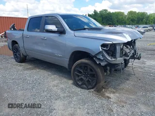 2023 Ram 1500 Laramie with VIN 1C6SRFJT4PN667913, listed as a IAAI auction lot 42223411 with 53,513 mi miles and . Bid and sale history available at DreamBid. Image 1.