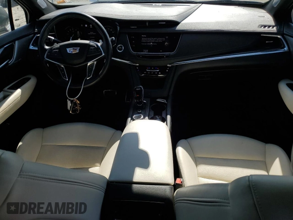2023 Cadillac XT5 AWD Sport with VIN 1GYKNGRS7PZ133622, listed as a Copart auction lot 48342095 with 63,008 mi miles and Salvage title. Bid and sale history available at DreamBid. Image 8.