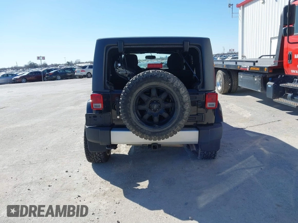 2013 Jeep Wrangler Unlimited Sahara with VIN 1C4BJWEG3DL617511, listed as a IAAI auction lot 41842979 with 149,980 mi miles and . Bid and sale history available at DreamBid. Image 16.