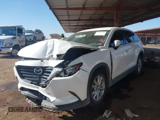 2016 Mazda CX-9 Sport with VIN JM3TCBBY0G0117159, listed as a IAAI auction lot 41302108 with 136,495 mi miles. Bid and sale history available at carsss.com. Image 17.