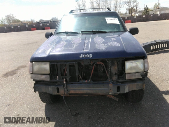 1994 Jeep Grand Cherokee Laredo with VIN 1J4GZ58Y3RC202638, listed as a IAAI auction lot 41885484 with 164,481 mi miles. Bid and sale history available at carsss.com. Image 6.