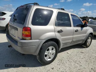 2001 Ford Escape XLT with VIN 1FMCU04101KF61126, listed as a Copart auction lot 76174744 with 0 mi miles and Salvage Title. Bid and sale history available at carsss.com. Image 3.