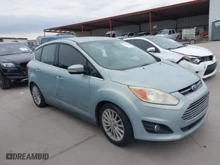 2013 Ford C-Max Hybrid SEL with VIN 1FADP5BU8DL523402, listed as a IAAI auction lot 41676386 with 214,649 mi miles. Bid and sale history available at carsss.com. Image 1.