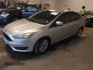 2016 Ford Focus SE z VIN 1FADP3F24GL393913, wystawiony jako IAAI lot #42640803 z przebiegiem 89 547 mil mil oraz . Historia ofert i sprzedaży dostępna na DreamBid. Obrazek 2.