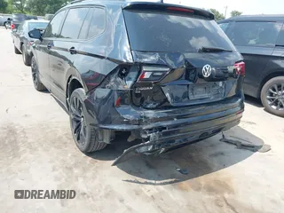 2021 Volkswagen Tiguan SE z VIN 3VV3B7AX0MM047478, wystawiony jako IAAI lot #42144239 z przebiegiem 55 468 mil mil oraz . Historia ofert i sprzedaży dostępna na DreamBid. Obrazek 6.