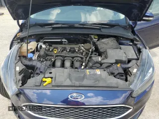 2016 Ford Focus SE z VIN 1FADP3F23GL288232, wystawiony jako Copart lot #62565095 z przebiegiem 11 634 mil mil oraz Szkoda całkowita • Salvage title. Historia ofert i sprzedaży dostępna na DreamBid. Obrazek 11.