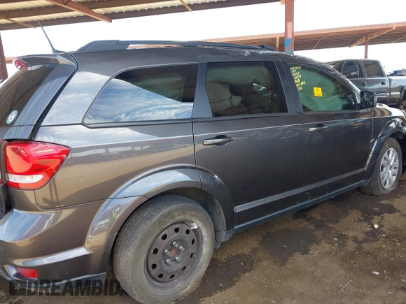 2019 Dodge Journey SE z VIN 3C4PDCBG9KT798938, wystawiony jako IAAI lot #42174970 z przebiegiem Nie podano mil oraz . Historia ofert i sprzedaży dostępna na DreamBid. Obrazek 8.