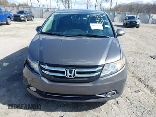 2016 Honda Odyssey Touring Elite with VIN 5FNRL5H90GB128006, listed as a IAAI auction lot 41695438 with 133,337 mi miles. Bid and sale history available at carsss.com. Image 12.