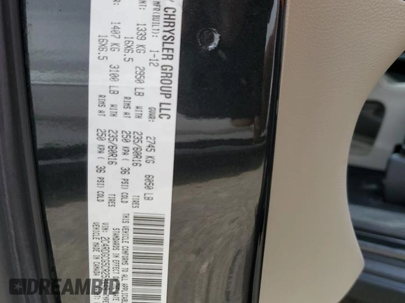 2012 Dodge Grand Caravan SXT with VIN 2C4RDGCG5CR253449, listed as a Copart auction lot 54592975 with 86,200 mi miles and Non Repairable. Bid and sale history available at DreamBid. Image 13.