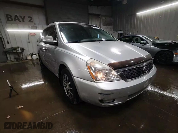 2012 Kia Sedona EX with VIN KNDMH4C7XC6483296, listed as a Copart auction lot 76624984 with 203,980 mi miles and Salvage Title. Bid and sale history available at carsss.com. Image 13.