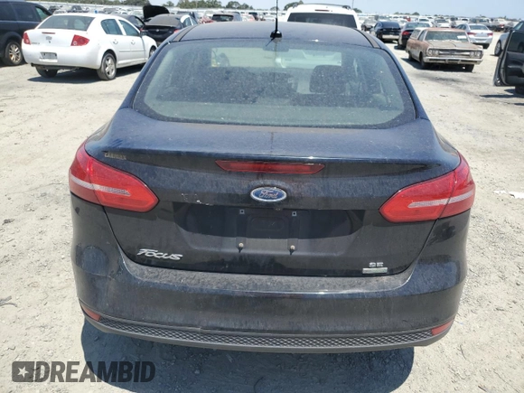 2018 Ford Focus SE with VIN 1FADP3FE8JL205699, listed as a Copart auction lot 63300795 with 128,877 mi miles and Clean title. Bid and sale history available at DreamBid. Image 6.