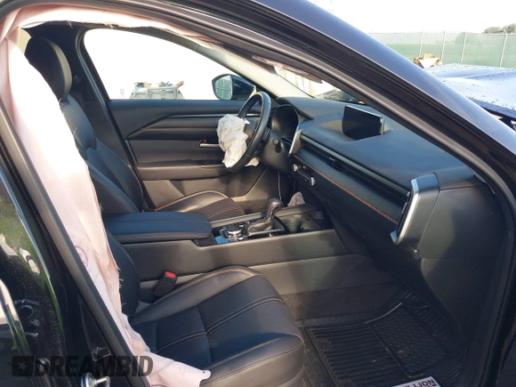 2023 Mazda CX-50 2.5 Turbo with VIN 7MMVABXY9PN154424, listed as a IAAI auction lot 40132755 with 10,620 mi miles. Bid and sale history available at carsss.com. Image 5.