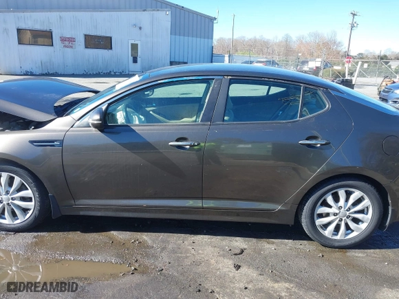 2014 Kia Optima EX with VIN 5XXGN4A78EG320367, listed as a IAAI auction lot 41858824 with 216,987 mi miles. Bid and sale history available at carsss.com. Image 14.