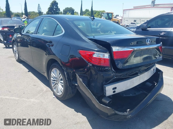 2014 Lexus ES 330 with VIN JTHBK1GG0E2117003, listed as a IAAI auction lot 42520609 with 97,207 mi miles and . Bid and sale history available at DreamBid. Image 3.