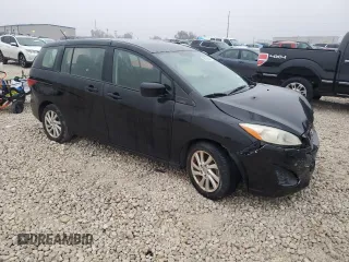2012 Mazda 5 Sport z VIN JM1CW2BL0C0142657, wystawiony jako Copart lot #85156244 z przebiegiem 107 628 mil mil oraz Szkoda całkowita • Salvage title. Historia ofert i sprzedaży dostępna na DreamBid. Obrazek 4.