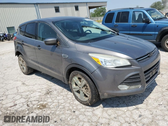 2013 Ford Escape SE with VIN 1FMCU9GX7DUA54057, listed as a Copart auction lot 60040545 with 173,086 mi miles and Salvage title. Bid and sale history available at DreamBid. Image 4.
