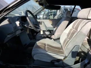 1987 Chevrolet Cavalier with VIN 1G1JE31W5H7194966, listed as a Copart auction lot 48345315 with 111,052 mi miles and Salvage Title. Bid and sale history available at DreamBid. Image 7.