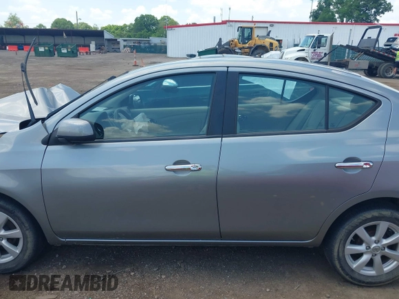 2012 Nissan Versa SV with VIN 3N1CN7APXCL812936, listed as a IAAI auction lot 42533280 with 78,071 mi miles and . Bid and sale history available at DreamBid. Image 15.